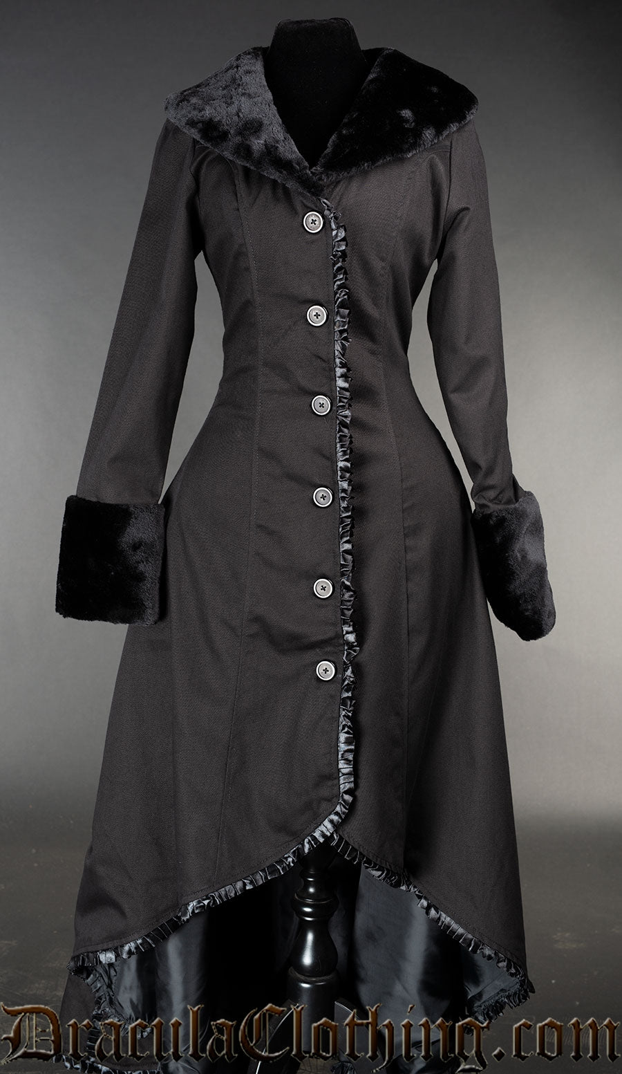 Women's black cotton high low coat with faux fur accents, satin lining and frilled trim along the buttons