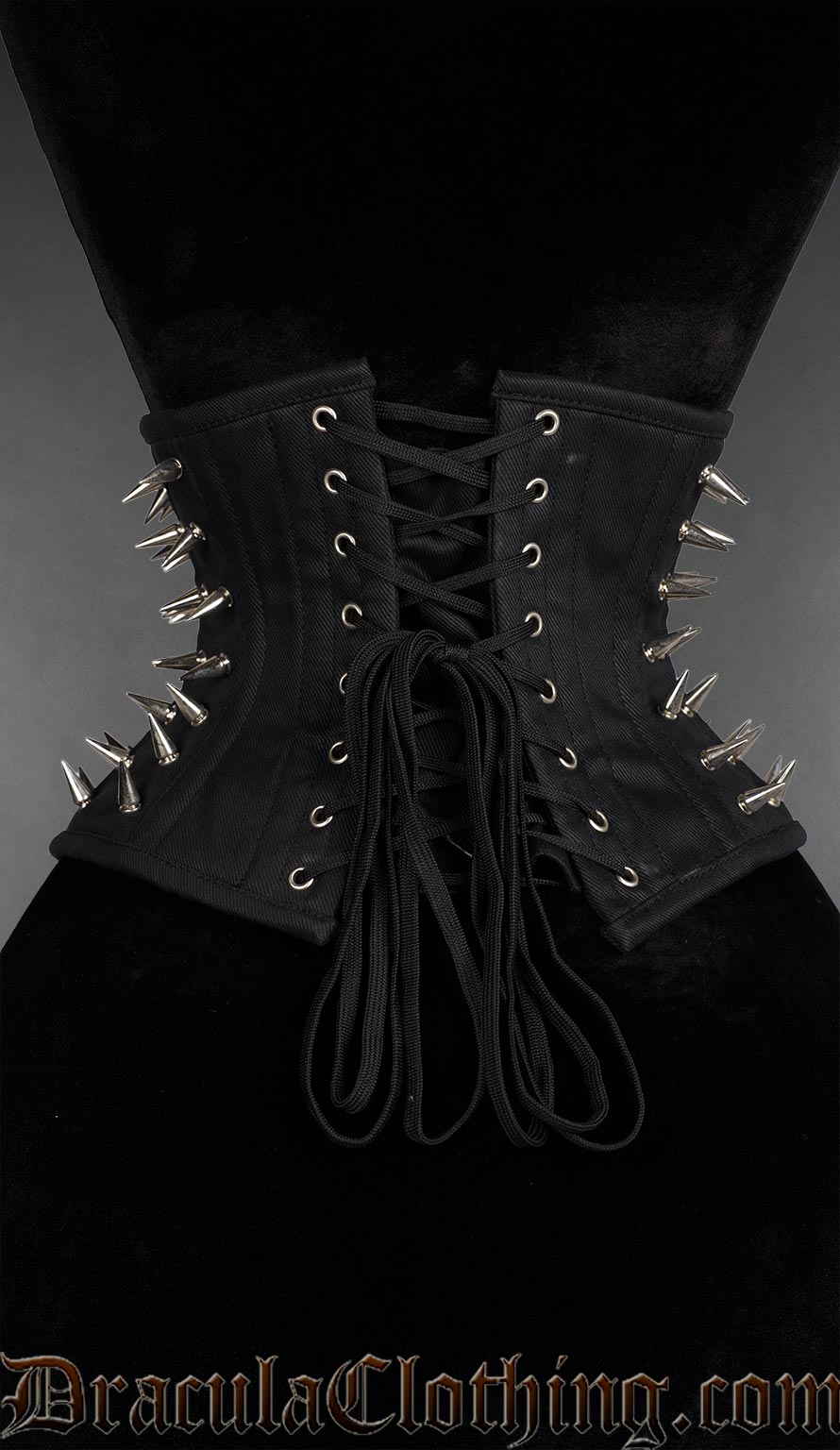 Back view of Black cotton spiked waist cincher with silver metal studs in gothic punk style. Fully steel boned with spiral metal boning in the sides and busk in the back and front
