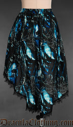 Back view of women's high low skirt with black lace trim and blue and black pirate skull inspired print