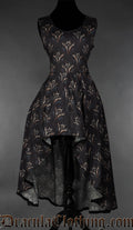 Women's high low sleeveless dress with printed dragon design on a black background
