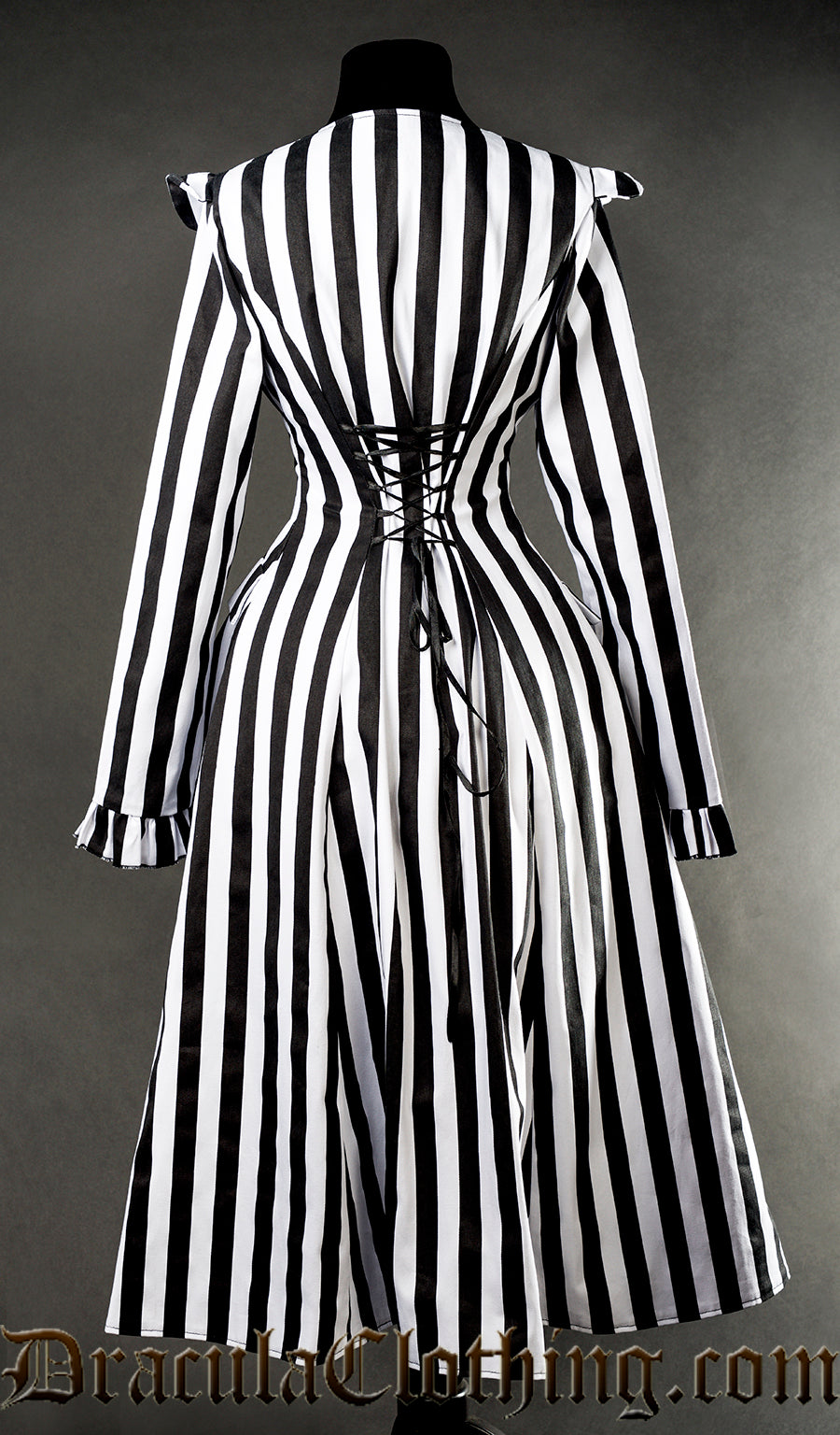 Back view of striped black and white EGA coat showing adjustable corset style lacing in the torso