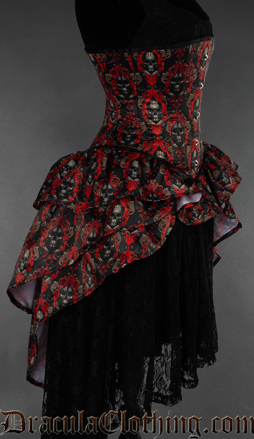Side view of red and black skull print bustle corset showing layered bustle attachment