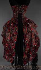 Back view of women's skull print bustle corset showing matching modesty panel adjustable lacing and longer bustle skirt in the back