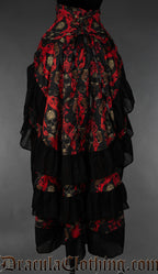 Back view of red and black skull design layered women's bustle skirt showing adjustable corset style lacing at the waist and three tiered layers in the skirt