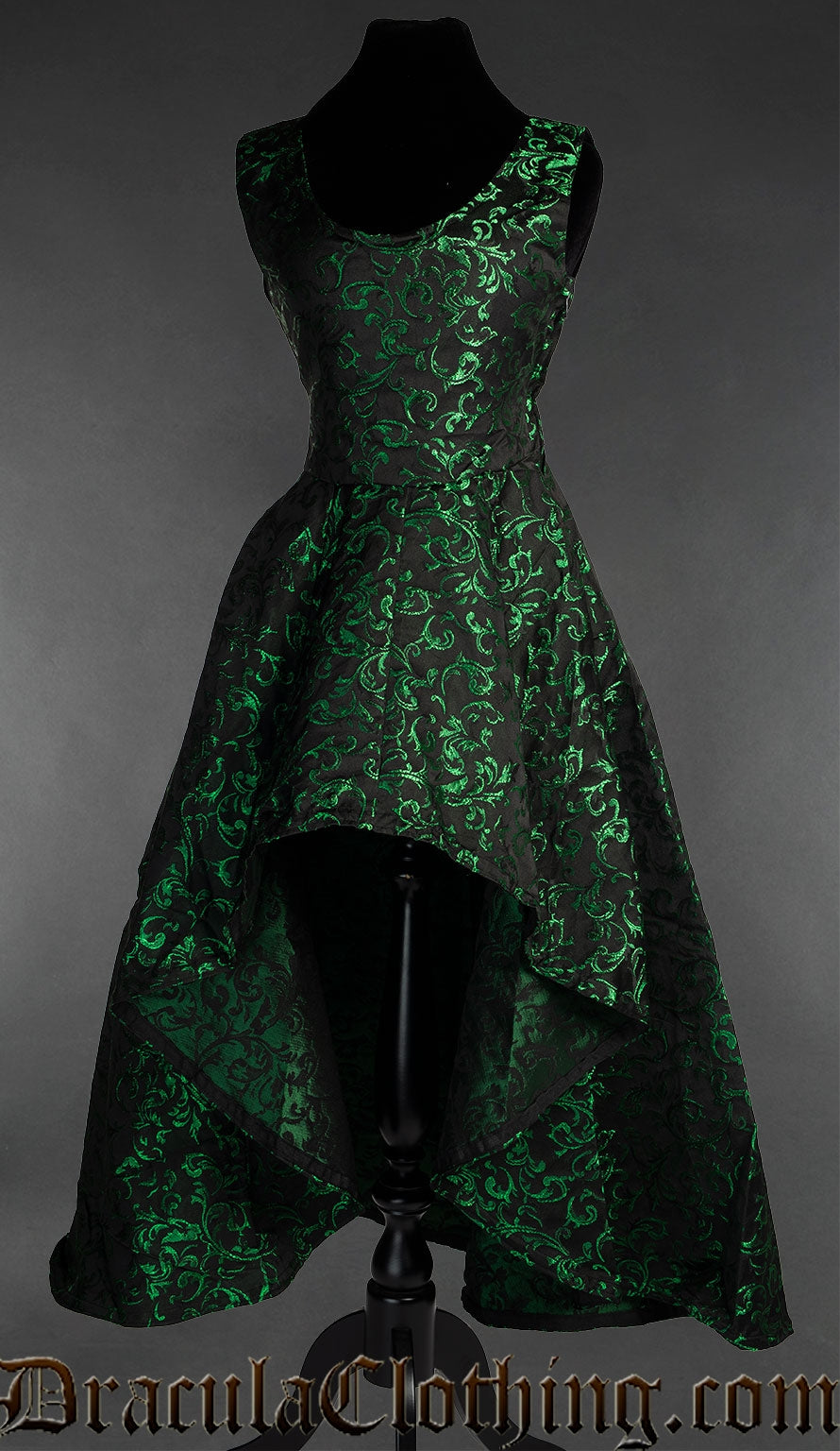Women's sleeveless high low dress made from green and black brocade fabric