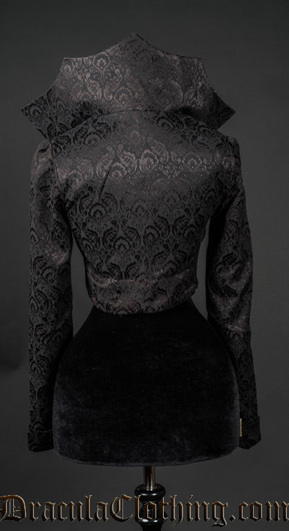 Back view of women's black brocade bodice jacket with large dramatic standing collar in the style of an old queen