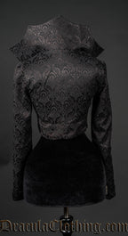 Back view of women's black brocade bodice jacket with large dramatic standing collar in the style of an old queen