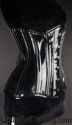 Side view of black PVC corset showing extreme waist style shaping