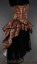 Printed corset with design of books on shelves and added bustle skirt layer attachment