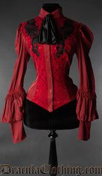 Women's red long sleeved blouse made from satin and brocade fabric with black embroidered details