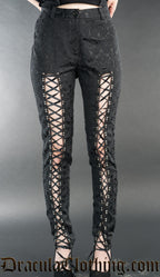 Women's high waisted black cotton brocade pants with laced open panels in the front of the leg