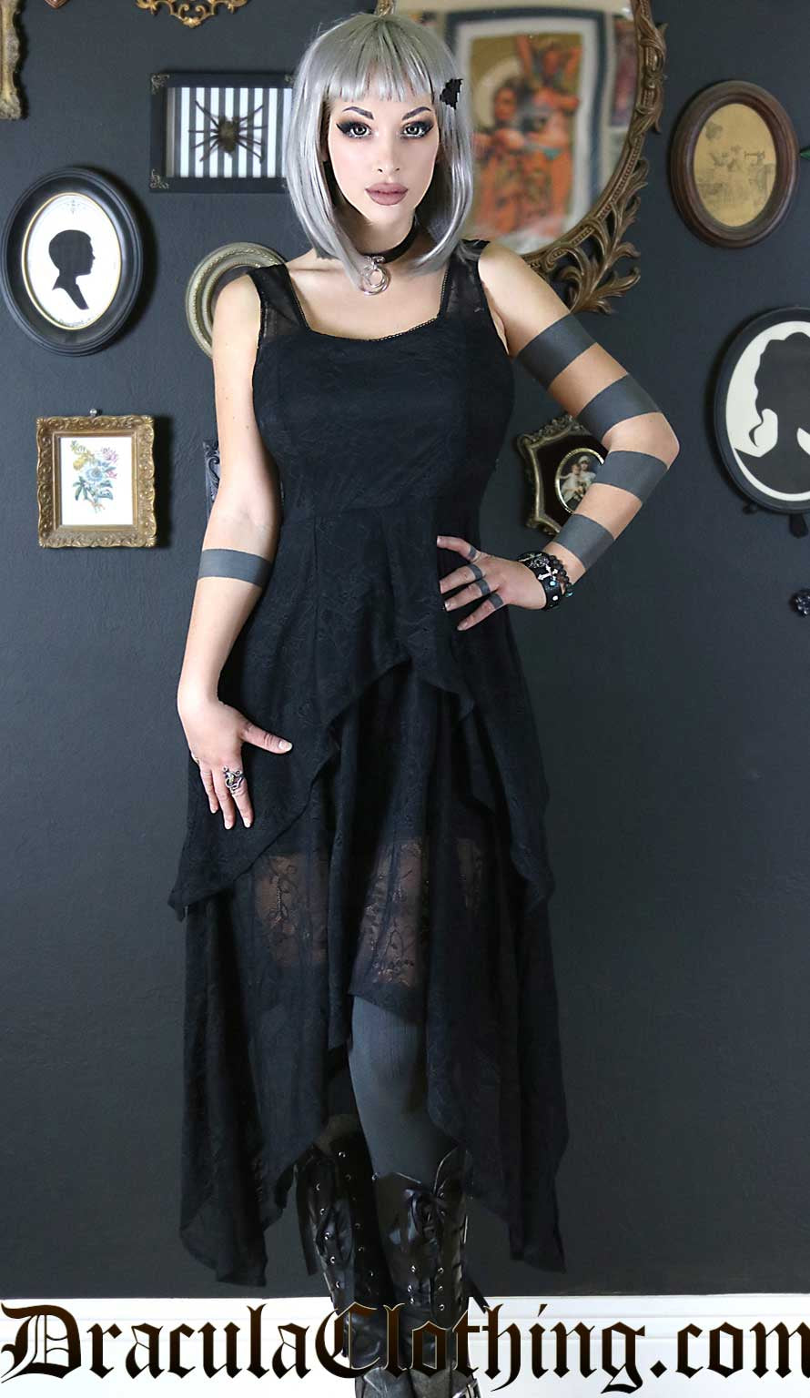 Women's sleeveless black dress with handkerchief hem made with black lace
