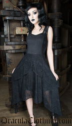 Women's sleeveless layered black lace dress worn by model