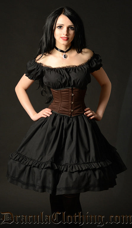 Black knee length women's dress shown on a model in an off shoulder styling 