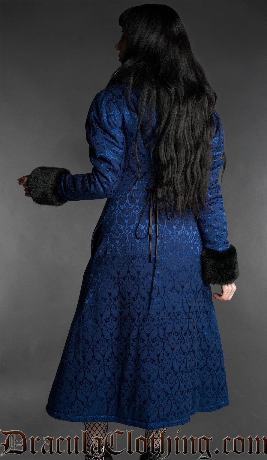 Blue gothic brocade coat with floral pattern, black faux fur trim cuffs and fitted back detail