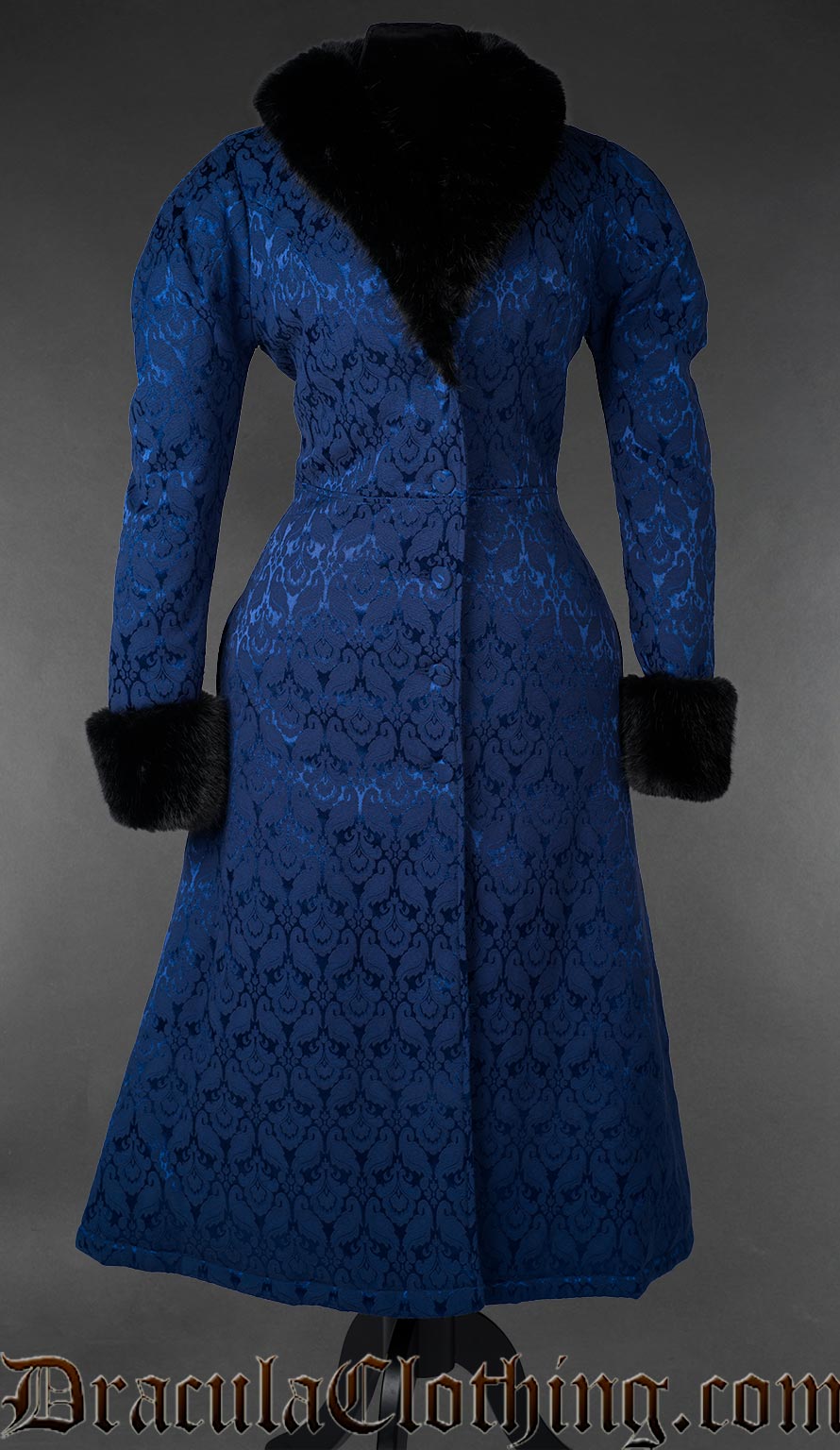 Blue gothic brocade coat with black faux fur collar and cuffs, front view on mannequin