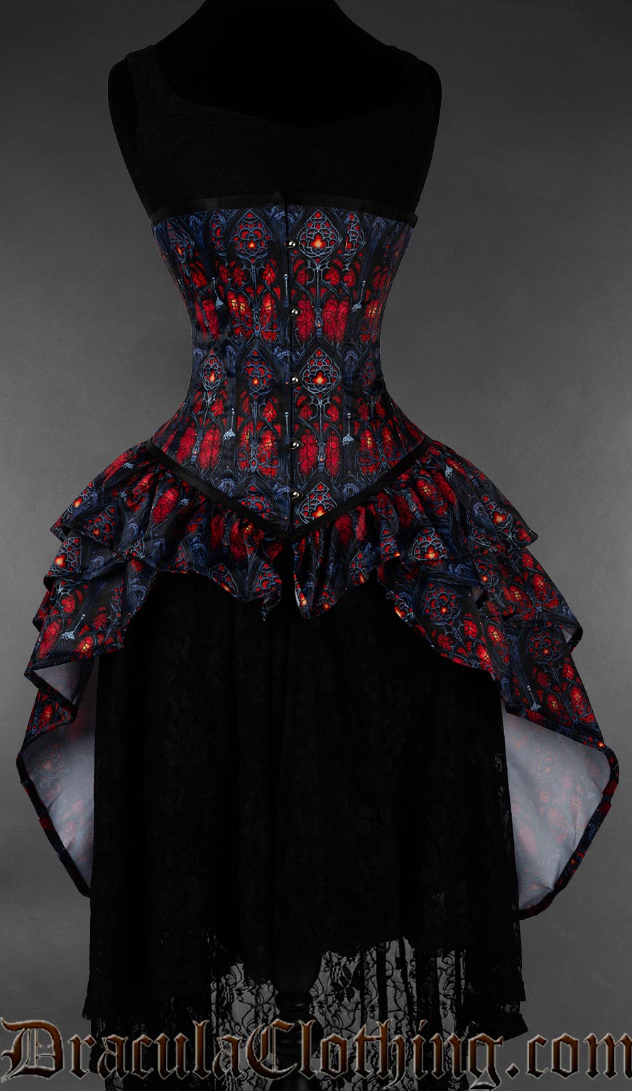 Red and black gothic bustle corset featuring cathedral inspired stained glass print