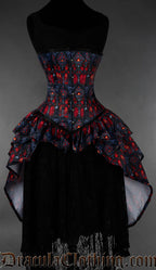 Red and black gothic bustle corset featuring cathedral inspired stained glass print
