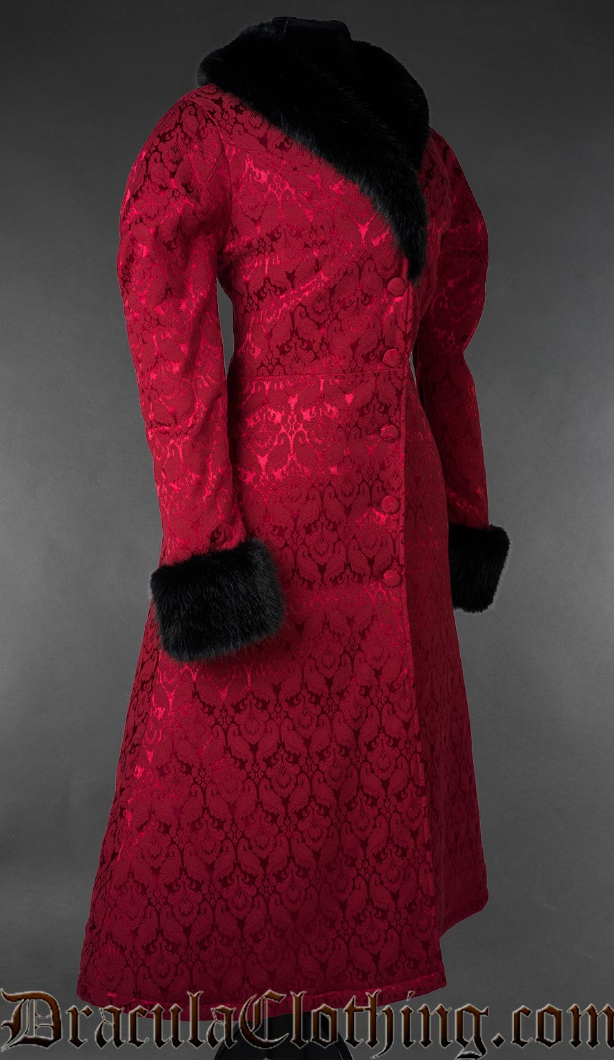 Red gothic brocade coat with black faux fur collar and cuffs, front view on a gray background