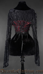 Black lace crop top with red underlay, corset back, and long sheer bell sleeves