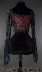 Black lace crop top with red underlay and long sheer bell sleeves