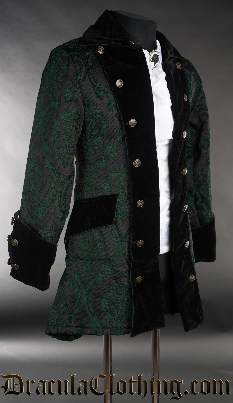 Side view of green brocade pirate jacket showing velvet accents and two rows of gold coloured decorative buttons