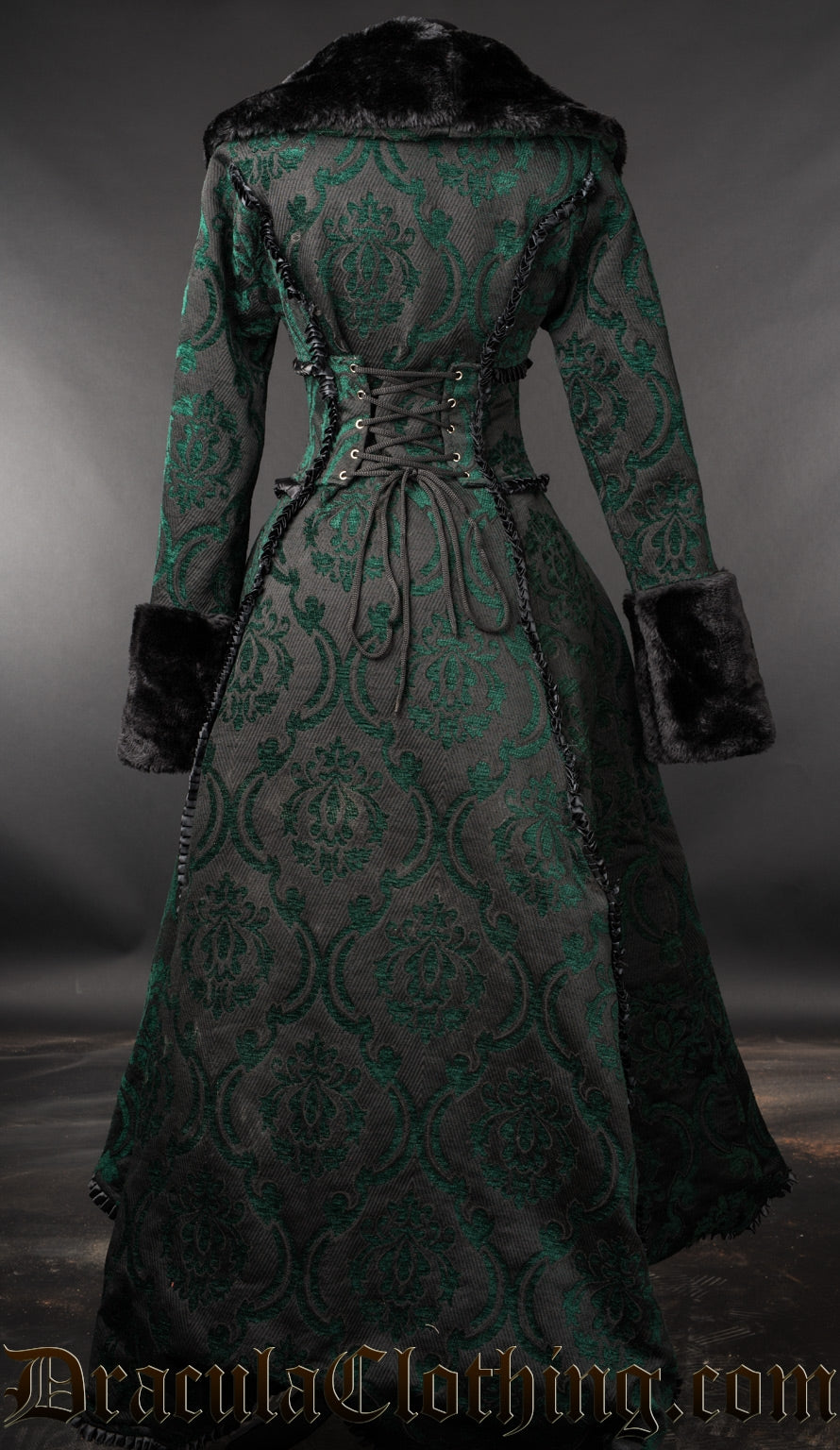 Back view of black and green brocade women's coat showing satin trim details and adjustable corset lacing in the back