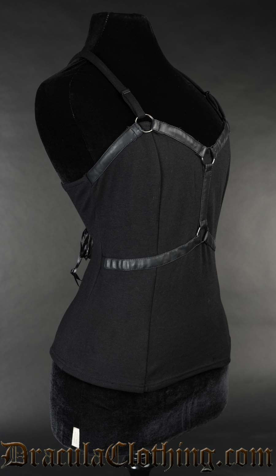 Side view of black harness top showing side of faux leather harness details