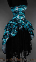 Blue and black gothic bustle corset featuring moonlit graveyard artwork side view