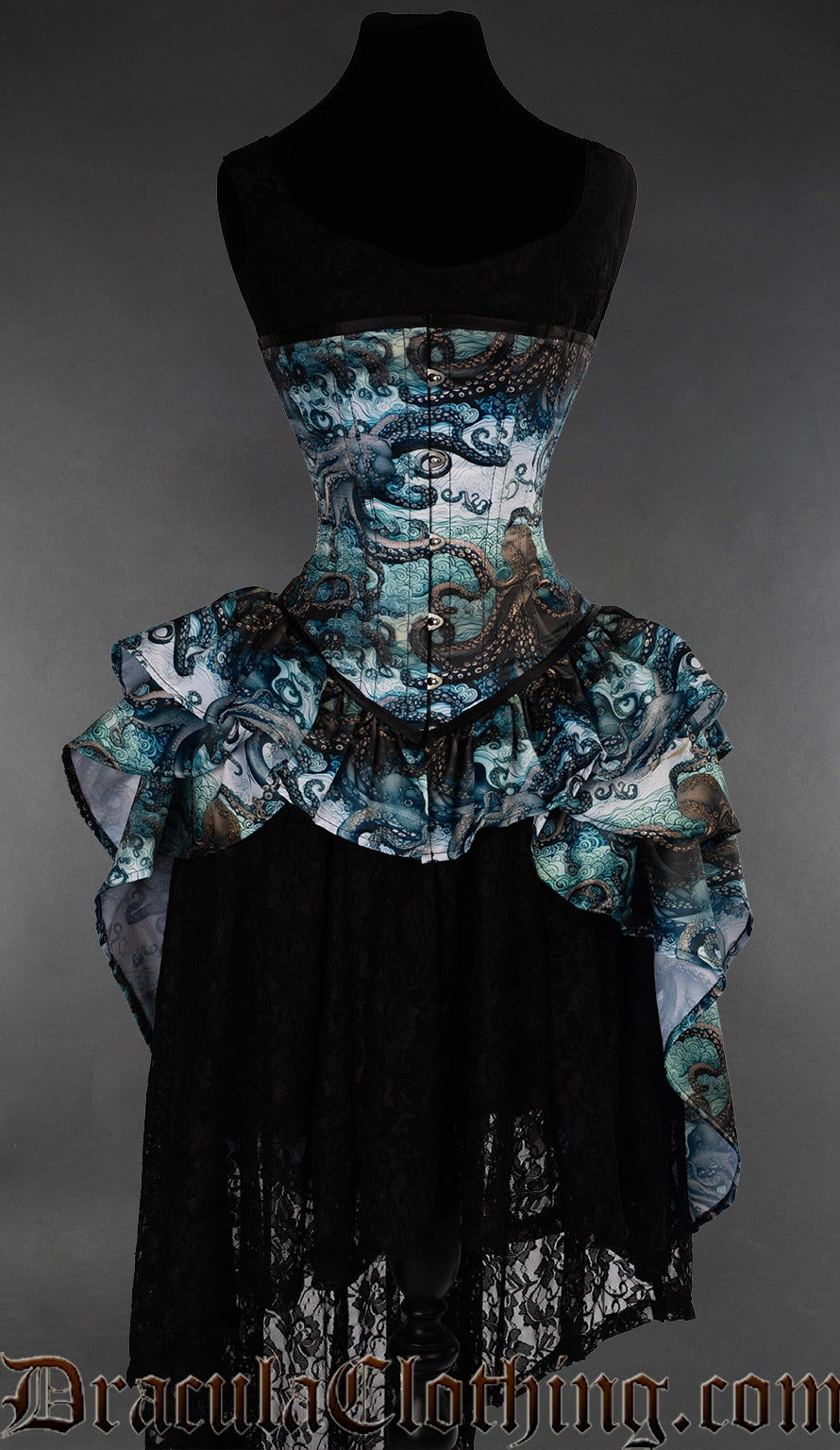 Women's printed bustle corset with kraken inspired blue multicoloured design pictured over a black skirt