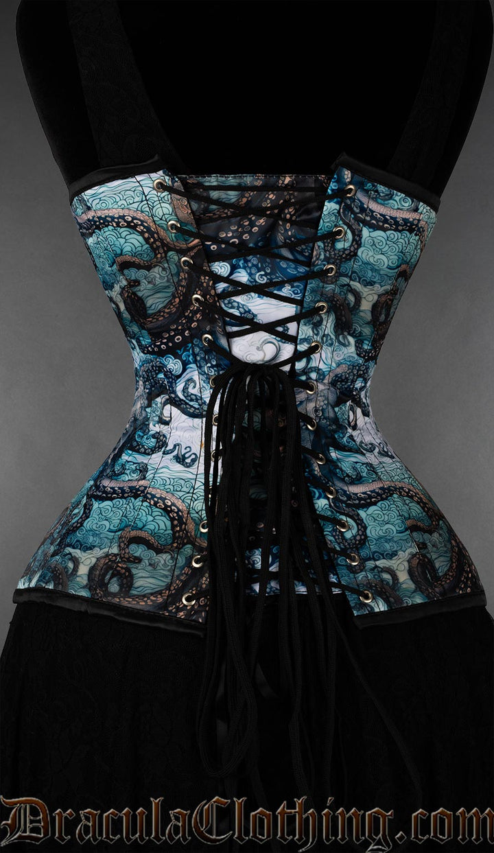 Back view of women's extreme waist corset with kraken print showing matching print modesty panel and adjustable lacing
