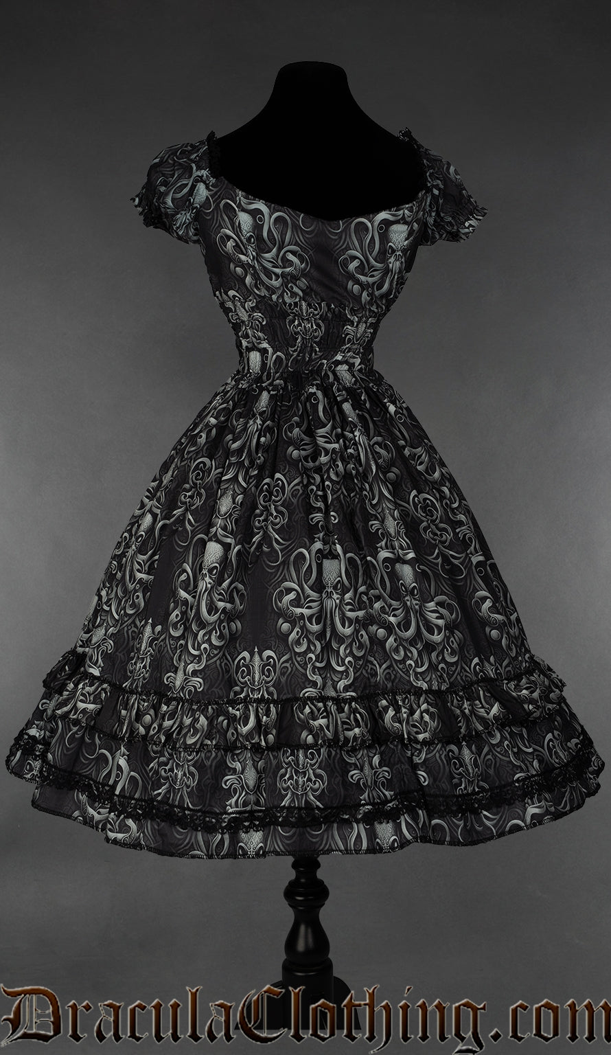 Back view of women's kraken print dress showing stretchy elasticated waist 