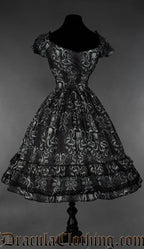 Back view of women's kraken print dress showing stretchy elasticated waist 