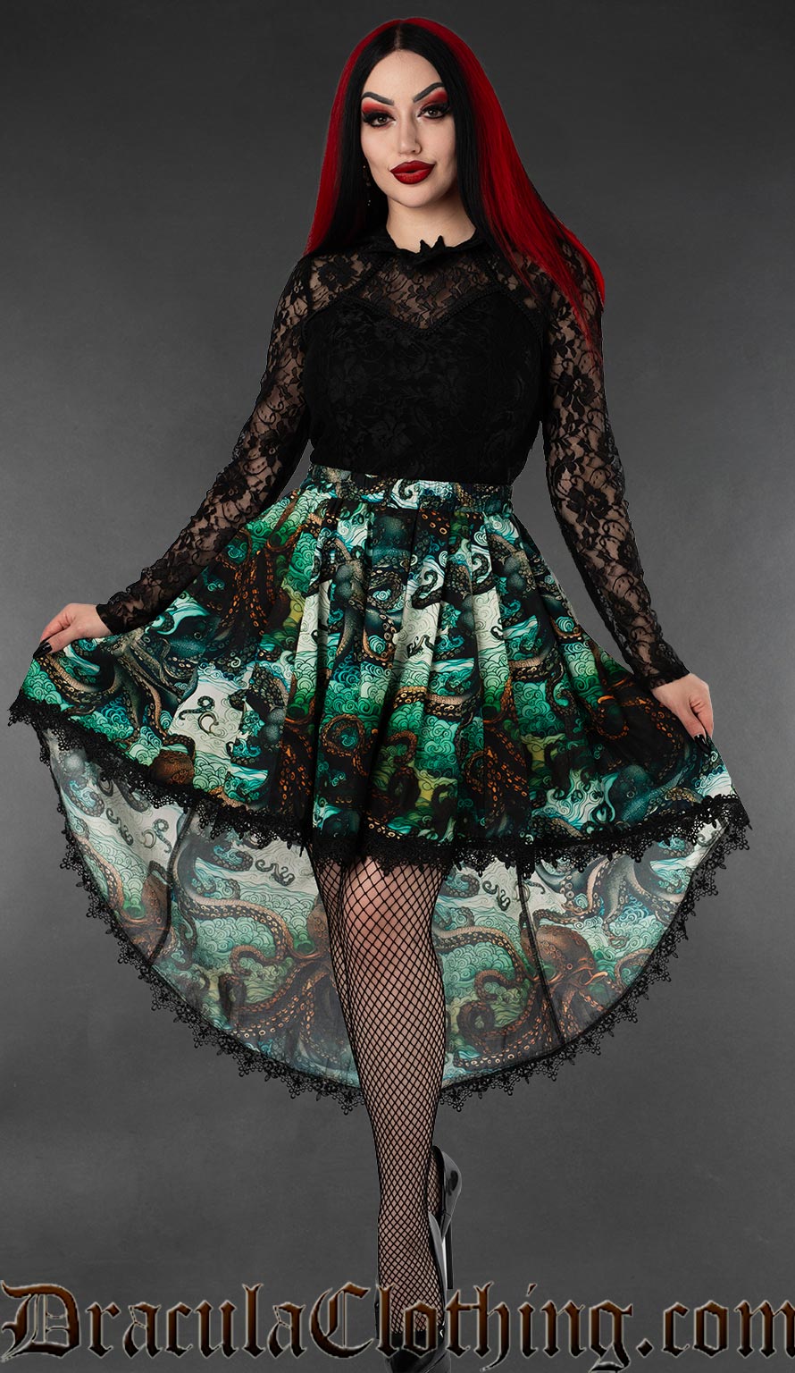 Model wearing kraken print high low skirt with black lace trim hem