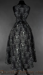 Back view of grey and black women's kraken print dress showing adjustable corset style lacing in the torso