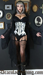 Model wearing black lace overdress over a corset and underwear showing trumpet style long sleeves and hood