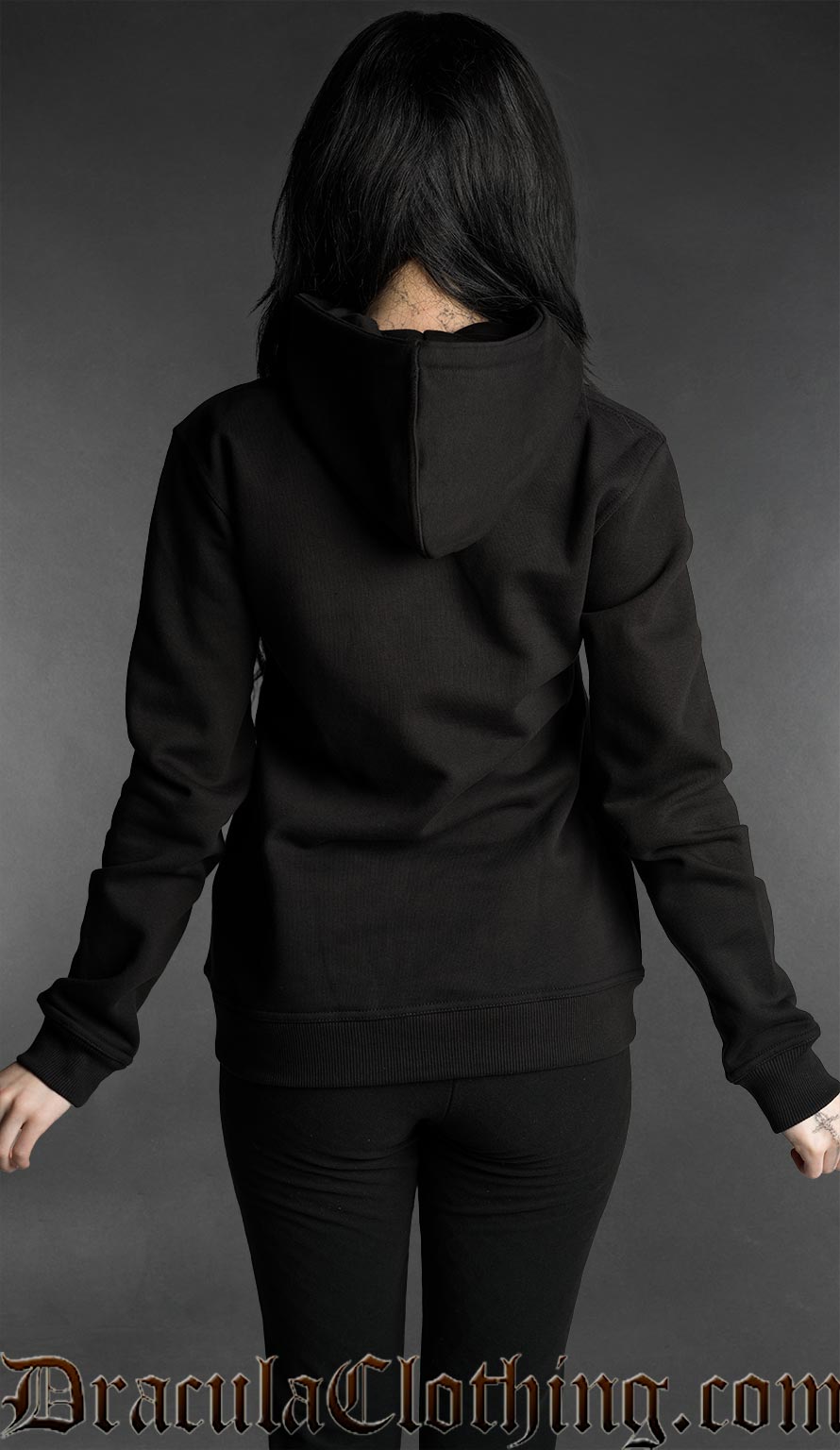 Back view of black gothic zip hoodie for women with hood and minimalist dark aesthetic design