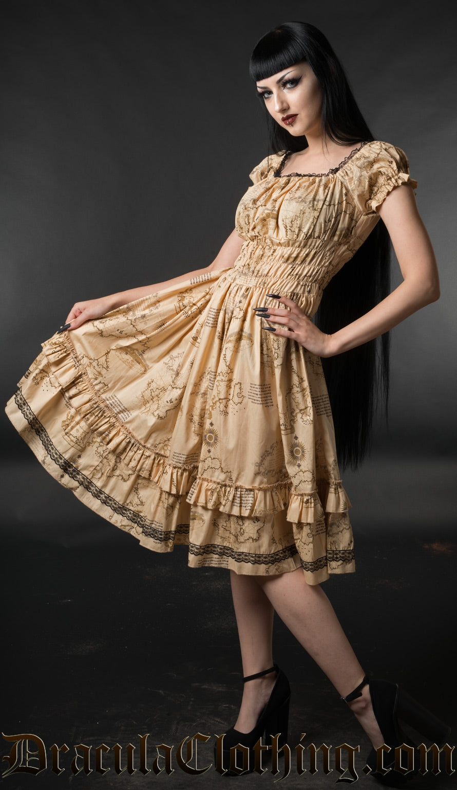 Model wearing knee length women's dress with old map inspired print