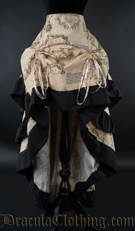 Women's beige skirt with printed map motif shown raised in the front with two strings