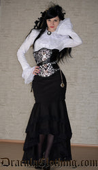 Long sleeved white cravat shirt worn by model with additional corset layered on top