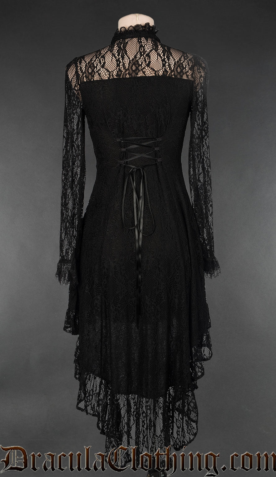 Back view of women's lace dress showing opaque back and adjustable corset style lacing in the torso