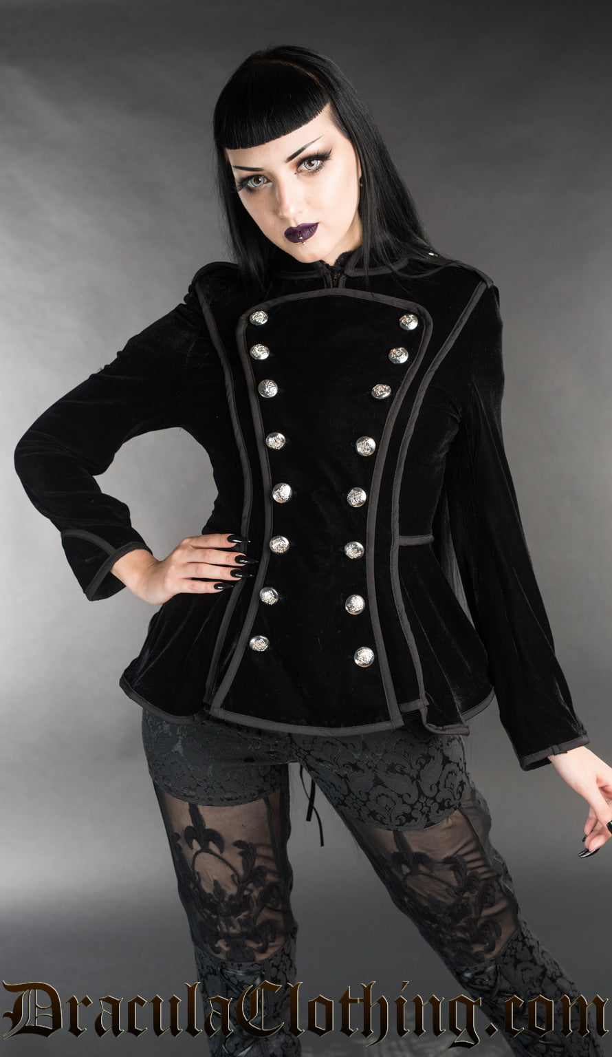 Model wearing women's black velvet military jacket