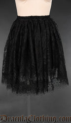Women's knee length black lace skirt with cotton lining and elasticated waistband