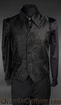Men's black brocade groom vest waistcoat with gothic patterned design pictured over a black long sleeved shirt