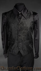 Men's black brocade groom vest waistcoat with gothic patterned design pictured over a black long sleeved shirt