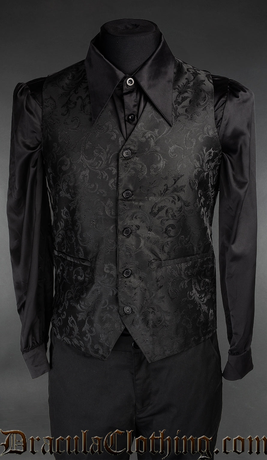 Men's black brocade groom vest waistcoat with gothic patterned design pictured over a black long sleeved shirt