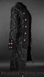 Side view of women's black pirate inspired coat showing decorative buttons on sleeve cuffs and lapels of double breasted design