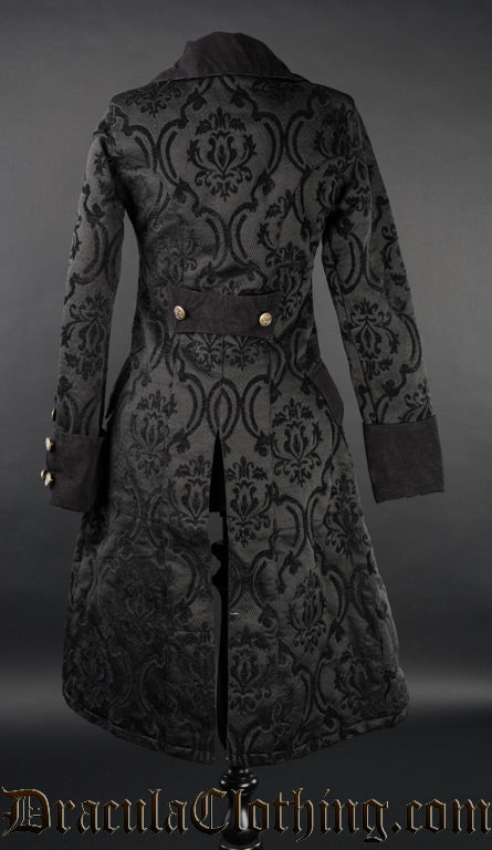 Back view of women's black brocade pirate coat showing decorative buttons on sleeve cuffs and half belt