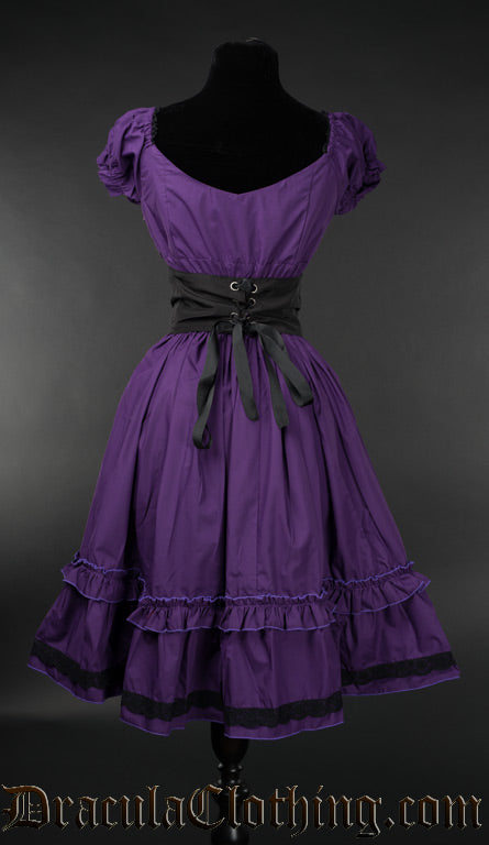 Back view of purple women's dress showing black belt with adjustable lacing to close