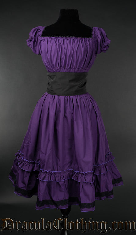 Women's purple knee length dress with black belt and square neckline with black lace trim